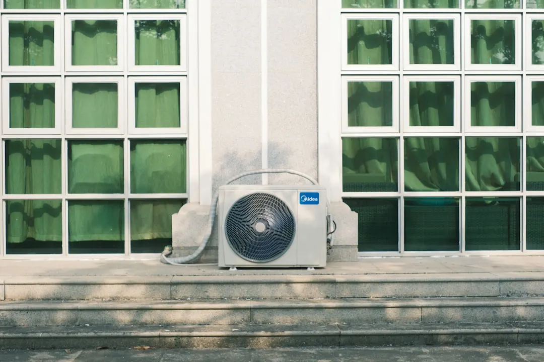 Residential outdoor AC unit installed at a Dallas home
