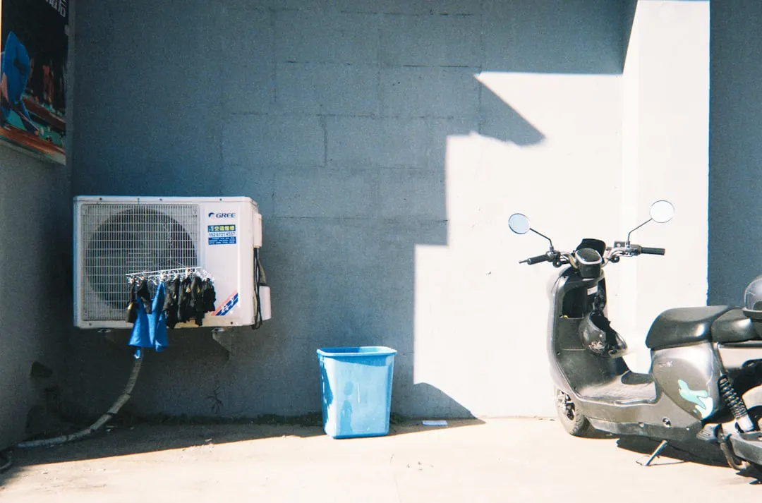 AC tune-up service on residential outdoor unit in Dallas
