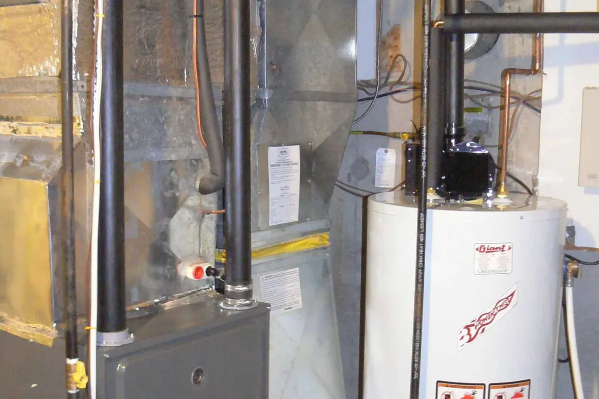 New high-efficiency gas furnace installed in a Dallas basement mechanical room