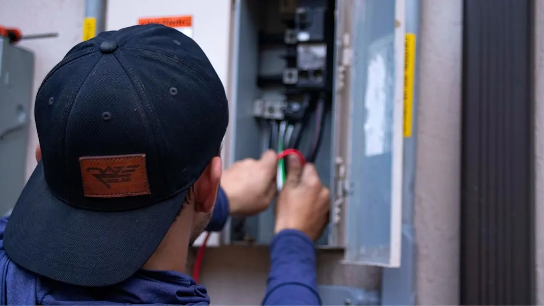 Dallas Air Conditioning technician installing a high-efficiency furnace